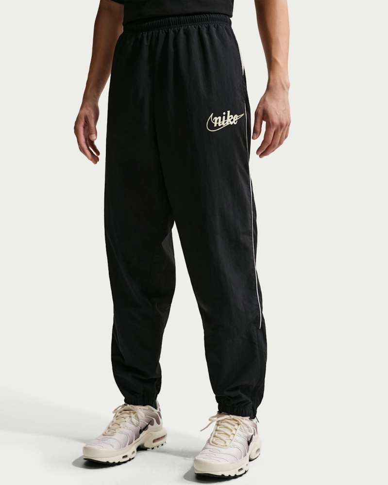 Штани Nike M NK CLUB LTWT PANT CTB IF0764-010 р. M чорний
