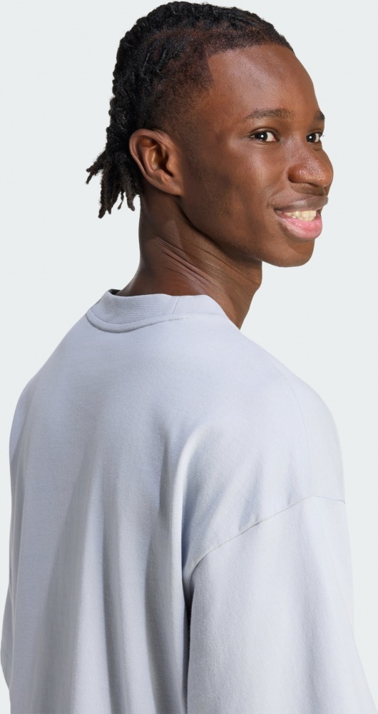 Футболка Adidas M FI SL T HALSIL KD7651 р.XL голубой