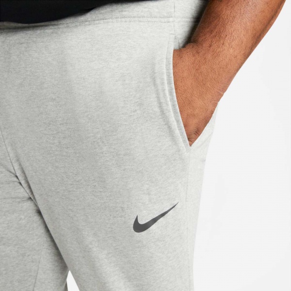Брюки Nike DF PNT TAPER FL CZ6379-063 р. M серый