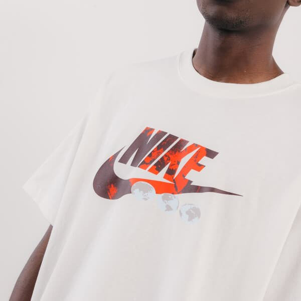 Футболка Nike M NSW TEE M90 BRING IT OUT HBR FB9809-133 р.S бежевий
