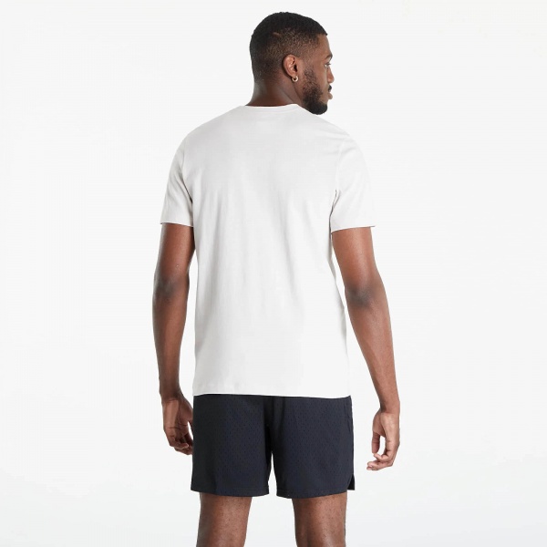 Футболка Jordan M J FLT ESS HBR SS CREW DH8970-104 р.XL блакитний