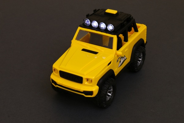 Позашляховик Shantou гірський зі звуковим і світловим ефектом 22х10х12 см жовтий 666-22P