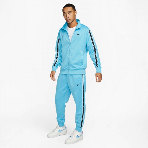 Брюки Nike M NSW REPEAT SW PK JOGGER DX2027-416 р. S голубой