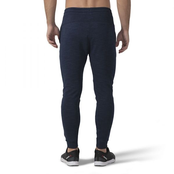 Брюки Reebok TE MARBLE GROUP JOG DU3782 р. S темно-синий