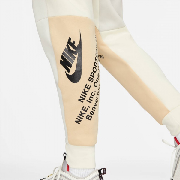 Штани Nike DM6480-252 р. 2XL бежевий