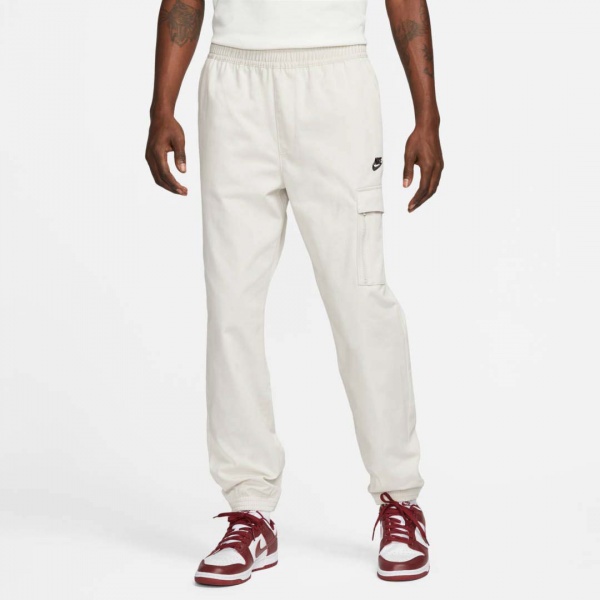 Брюки Nike M NSW SPU WVN PANT FD4336-072 р. M разноцветный