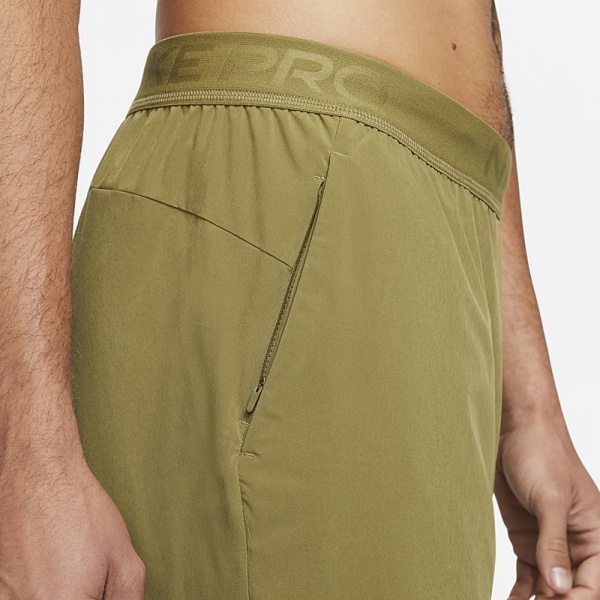Штани Nike DF FLEX VENT MAX PANT DM5948-378 р. M жовтий