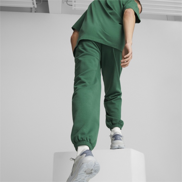Брюки Puma DOWNTOWN SWEATPANTS TR 53825037 р. M зеленый