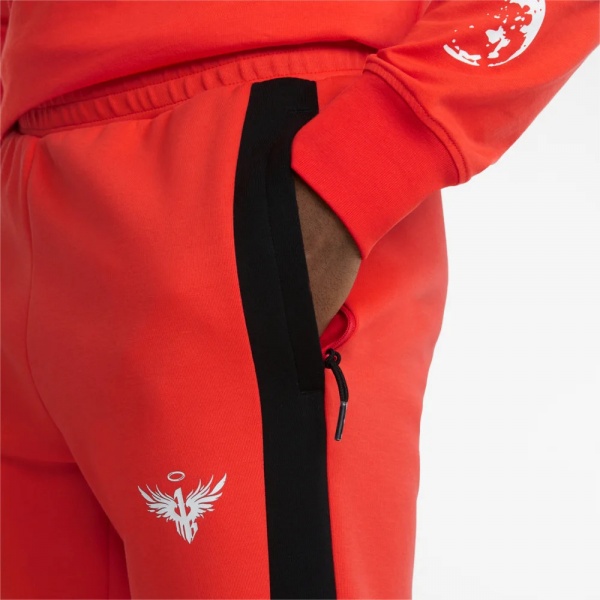 Брюки Puma MELO DIME PANT 53510801 р. XL оранжевый