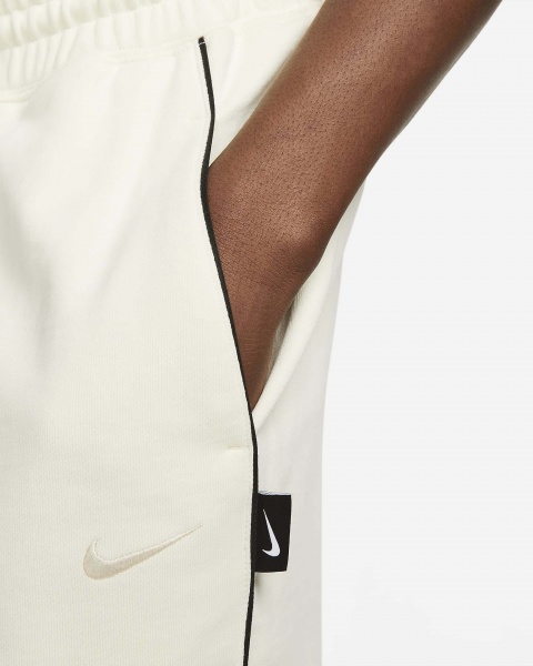 Штани Nike M NK SWOOSH FLC PANT DX0564-113 р. S бежевий
