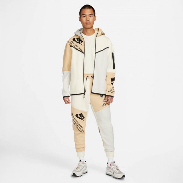 Штани Nike DM6480-252 р. 2XL бежевий