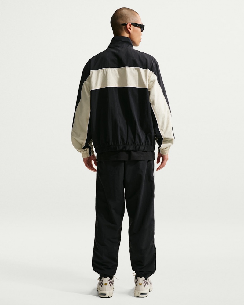 Штани Nike M NK CLUB LTWT PANT CTB IF0764-010 р. M чорний