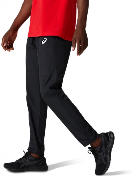 Брюки Asics CORE WOVEN PANT 2011C342-001 р. M черный