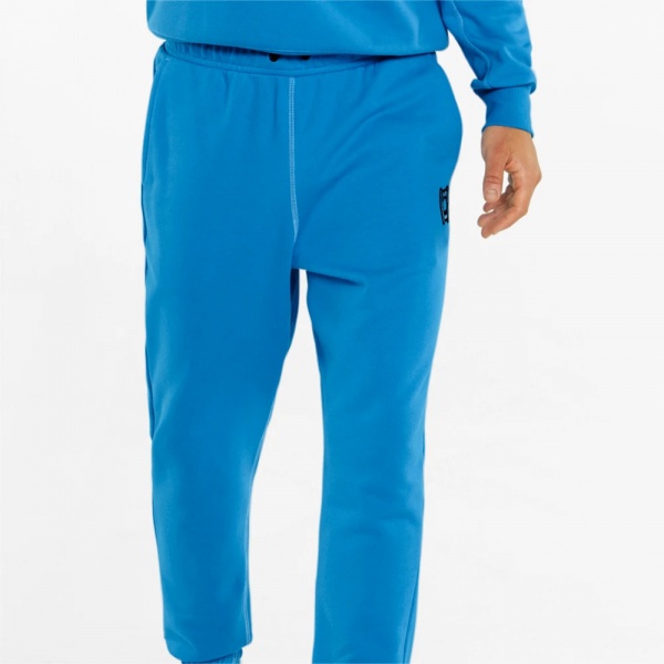 Штани Puma PIVOT PANT EMB 53325109 р. M блакитний