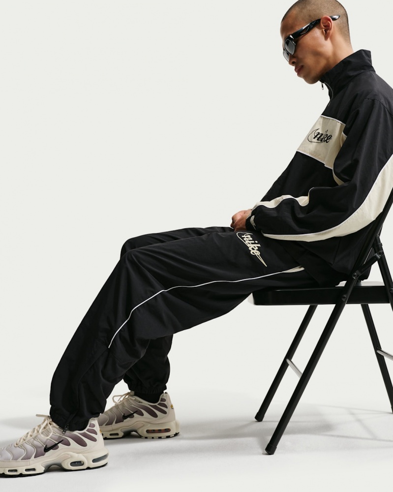 Штани Nike M NK CLUB LTWT PANT CTB IF0764-010 р. S чорний