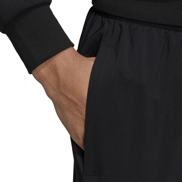 Брюки Adidas E LIN T STANFRD DQ3099 р. S черный