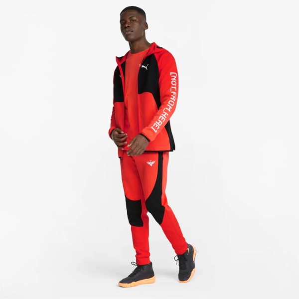 Брюки Puma MELO DIME PANT 53510801 р. XL оранжевый