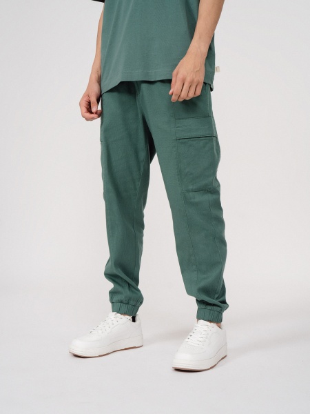 Брюки Outhorn TROUSERS CAS M198 OTHSS23TTROM198-44S р. S зеленый