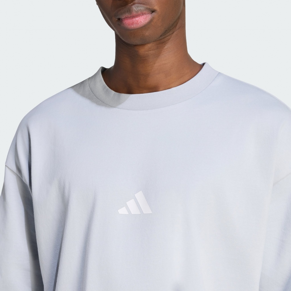 Футболка Adidas M FI SL T HALSIL KD7651 р.S блакитний