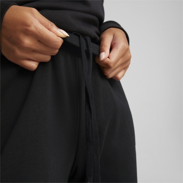 Брюки Puma ESS+ METALLIC PANTS FL PUMA BLACK-SILVER 84995951 р. XS черный