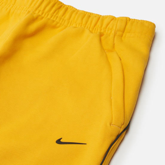 Штани Nike M NRG NOCTA FLEECE PANT ESS DA3935-739 р. XL жовтий