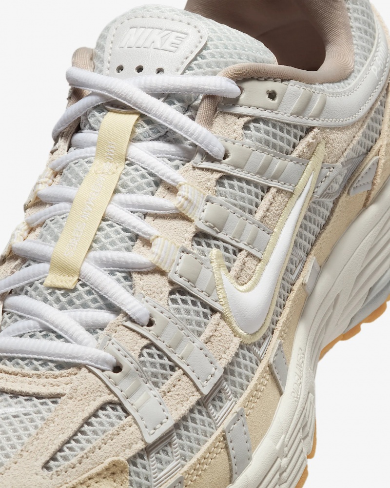 Кросівки жіночі демісезонні Nike W P-6000 OPP1 HV4312-025 р.38,5 сірі із жовтим