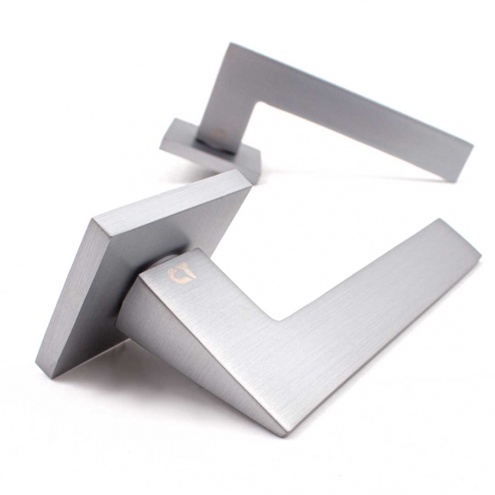 Ручка на розетці Comit Nota 65699 брашований матовий хром