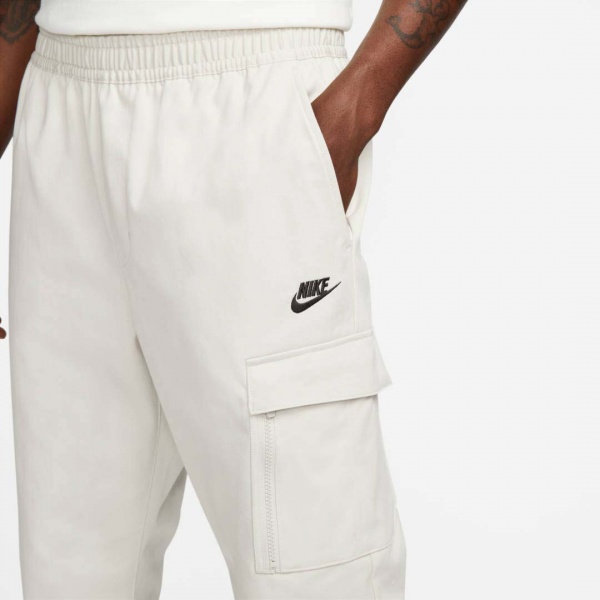 Брюки Nike M NSW SPU WVN PANT FD4336-072 р. XL разноцветный