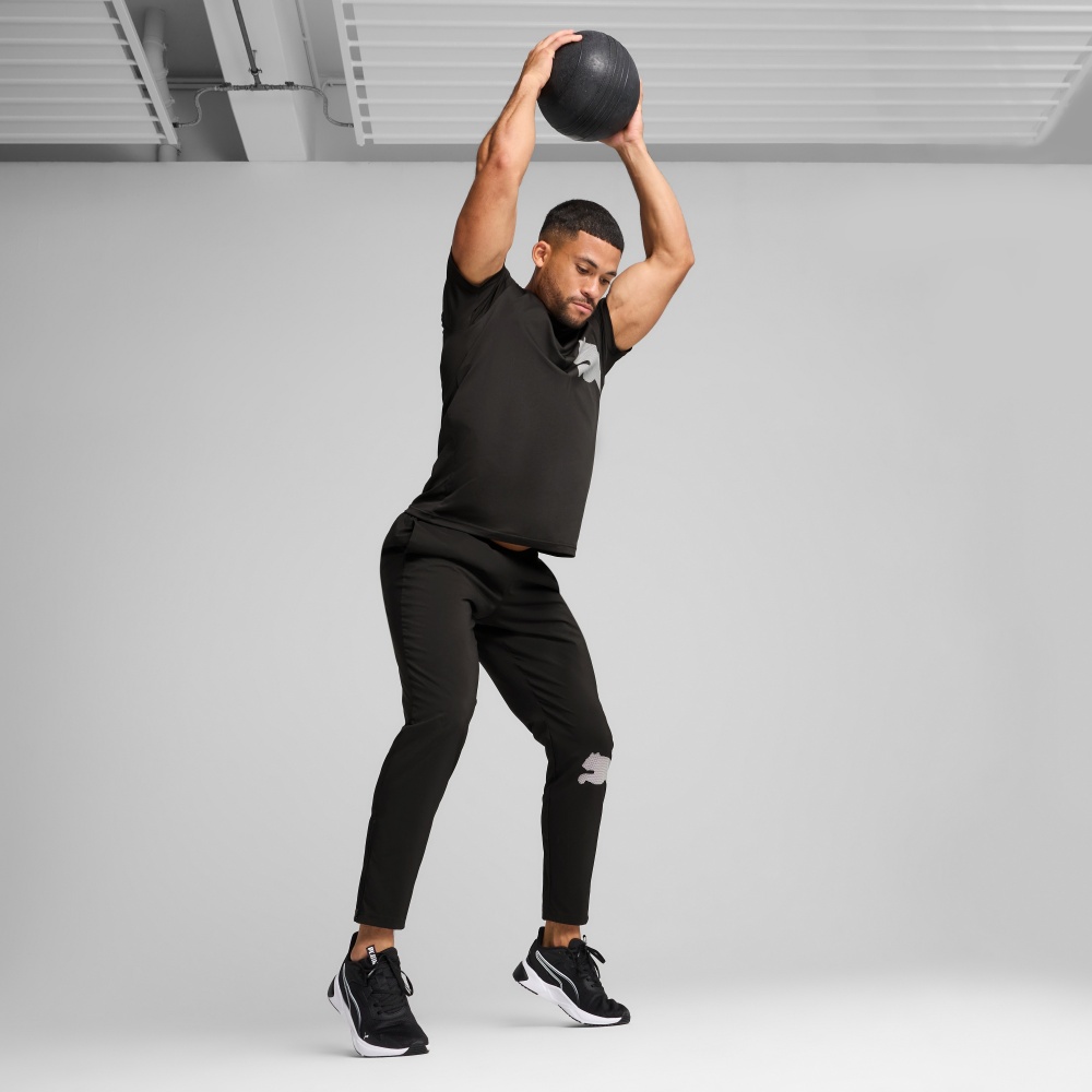 Брюки Puma M TAD BIG LOGO Woven Pant 52672501 р. XL черный