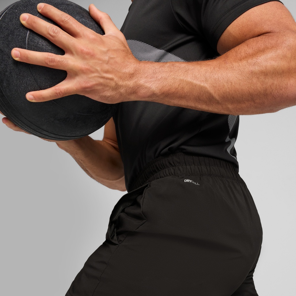 Брюки Puma M TAD BIG LOGO Woven Pant 52672501 р. XL черный