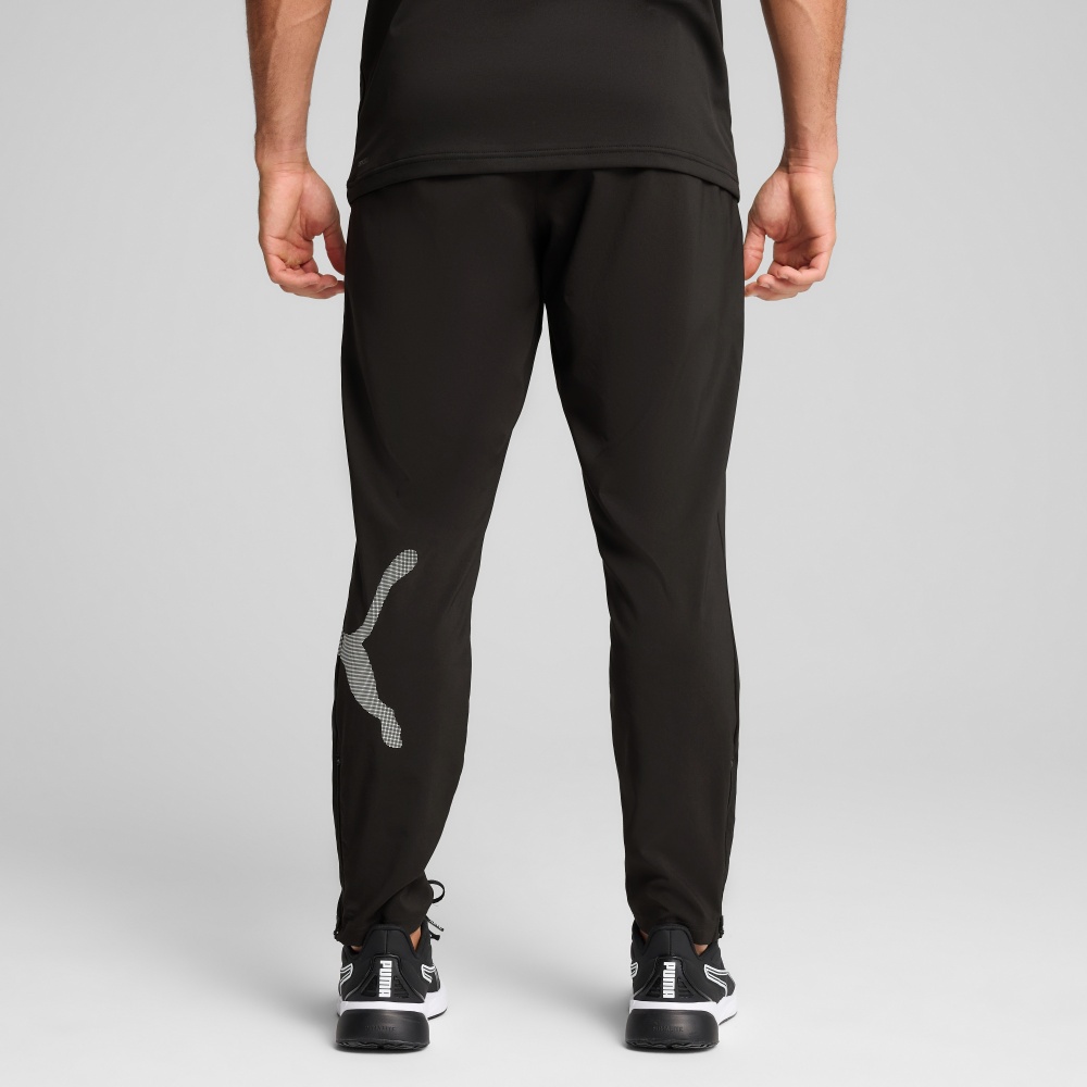 Брюки Puma M TAD BIG LOGO Woven Pant 52672501 р. XL черный