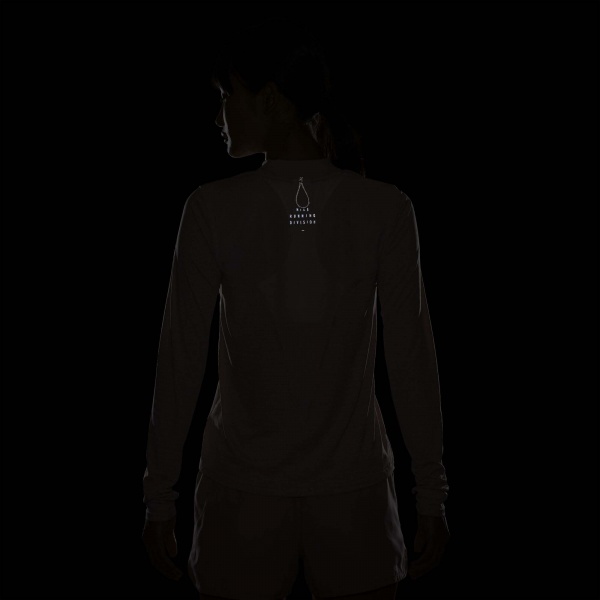 Футболка Nike W NK DF RUN DVN LS TOP DD6821-601 р.L рожевий