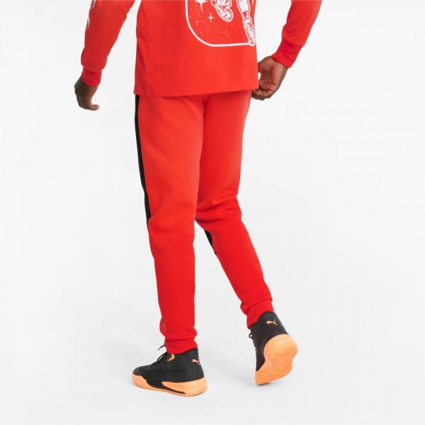 Брюки Puma MELO DIME PANT 53510801 р. XL оранжевый