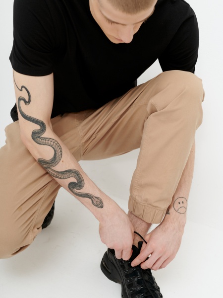 Штани Outhorn HOL21-SPMC600-83S р. 2XL бежевий