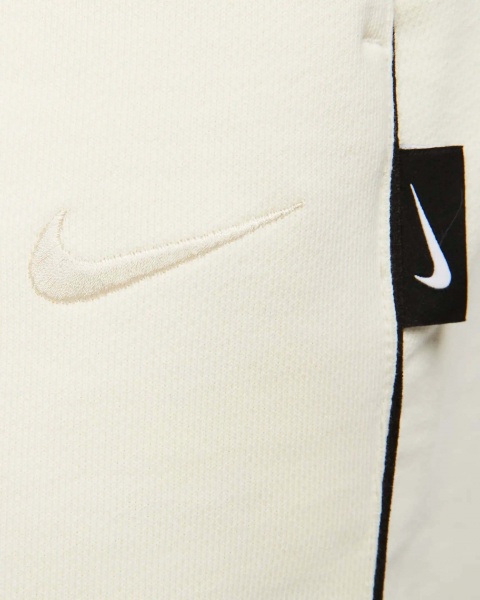 Штани Nike M NK SWOOSH FLC PANT DX0564-113 р. L бежевий