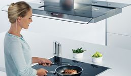 На какой высоте вешается кухонная вытяжка