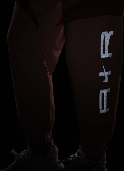 Штани Nike W NSW AIR FLC MR JGGR DD5419-601 р. M рожевий