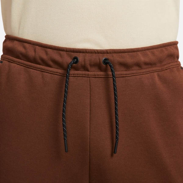 Штани Nike M NSW TCH FLC JGGR CU4495-259 р. M коричневий