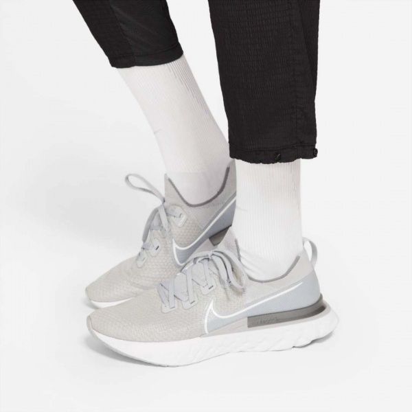 Брюки Nike M NK RUN DVN PHNM ELT PANT DA1290-010 р. L черный