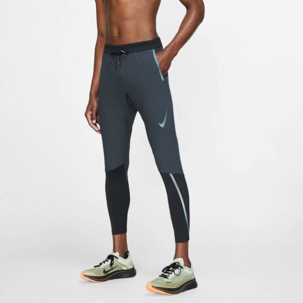 Штани Nike NK SWIFT PANT Nike BV4809-010 р. M чорний