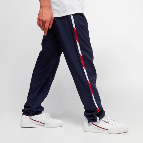 Брюки Tommy Hilfiger WOVEN PANT WITH TAPE S20S200209401 р. M темно-синий