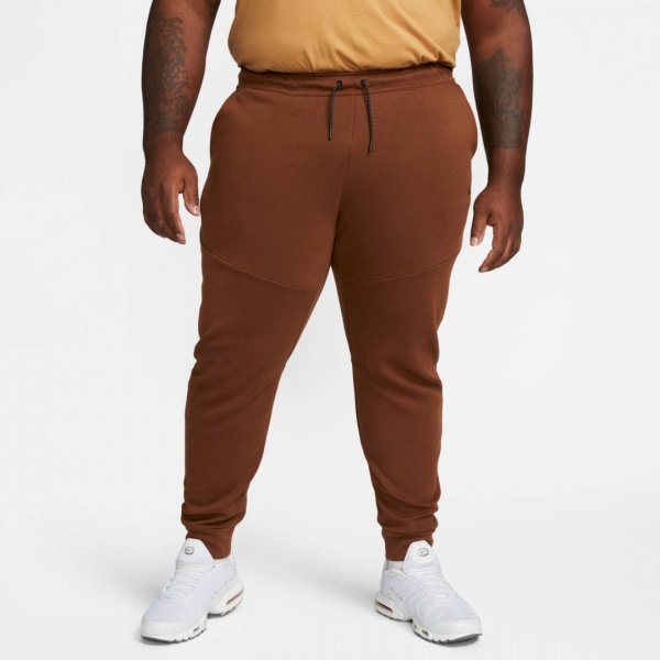 Штани Nike M NSW TCH FLC JGGR CU4495-259 р. S коричневий
