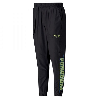 Брюки Puma Train FM Xtreme Woven Pant 51963701 р. S черный