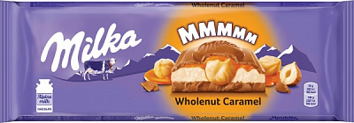 Шоколад Milka з цілими горіхами та карамеллю 300г